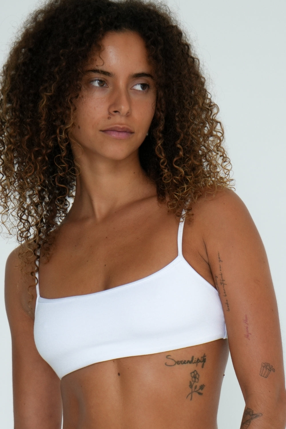 Women’s natural fibre bamboo bralette in white, breathable and soft for sensitive skin on model with white background